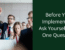 before you implement AI ask yourself one question. Person in a business setting raising hand.